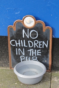 They can't come in, but feel free to leave them outside the pub door.  Copyright: Multifariousmeanderings.