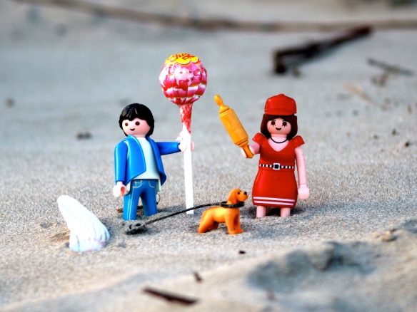 Mr Playmo had sent a crypted message to Mrs Playmo: "Meet you on the beach. Choose your weapon carefully". When he turned up with a lollipop and said something about sweetening up baddies before hitting them over the head, a bell rang in Mrs P's mind. A danger bell. 